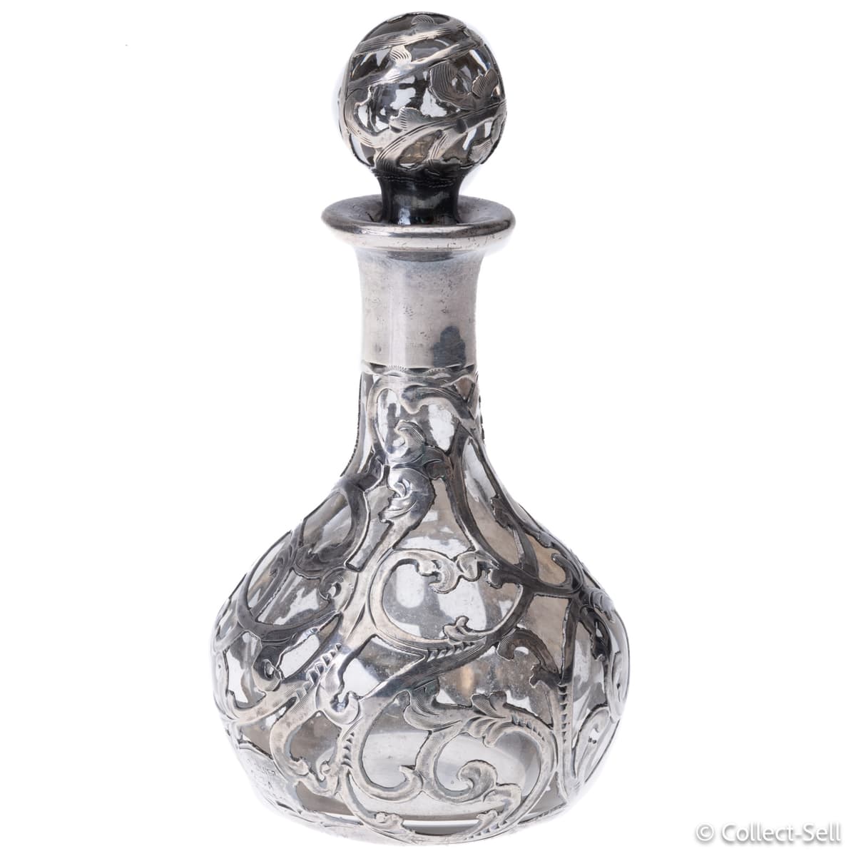 Antique silver overlay glass perfume bottle with ornate stopper, front view
