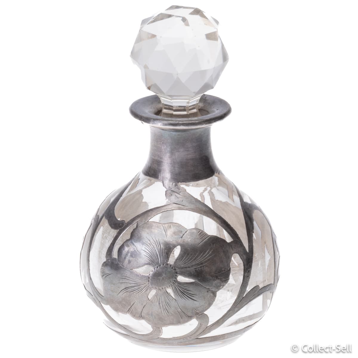 Antique Art Nouveau perfume bottle with floral silver deposit overlay and crystal stopper