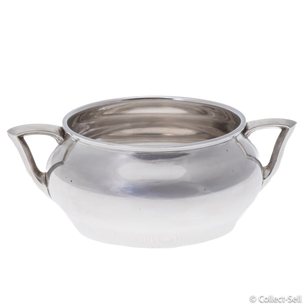 Side view of the Van Kempen .835 silver bowl showing the shallow profile, clean curves, and squared flared handles